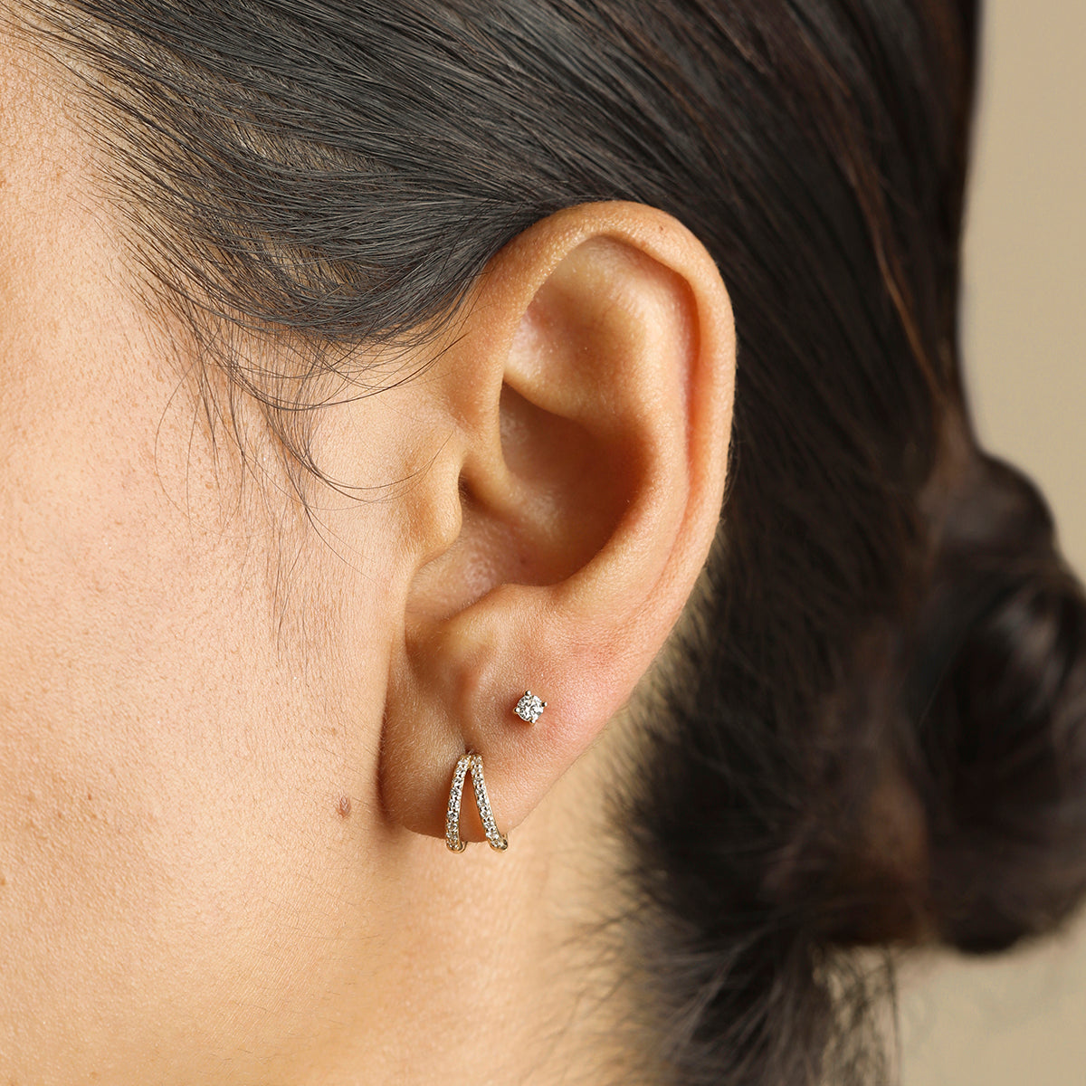 Huggie earrings with pavé diamonds in gold