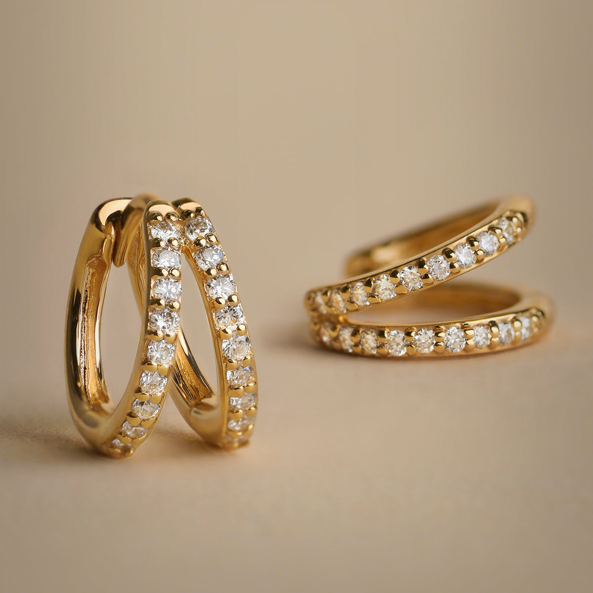 Huggie earrings with pavé diamonds in gold