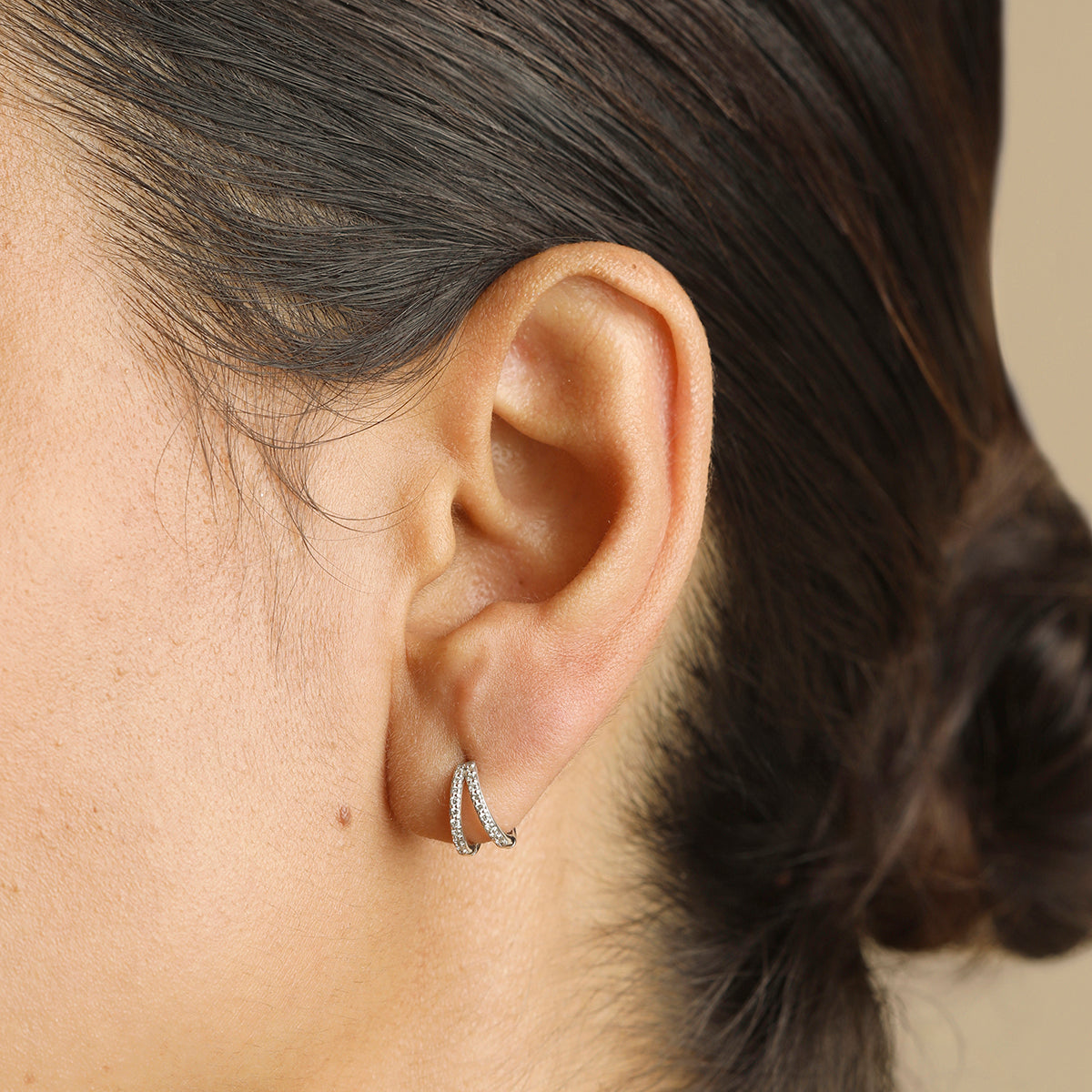 Huggie earrings with pavé diamonds in solid white gold