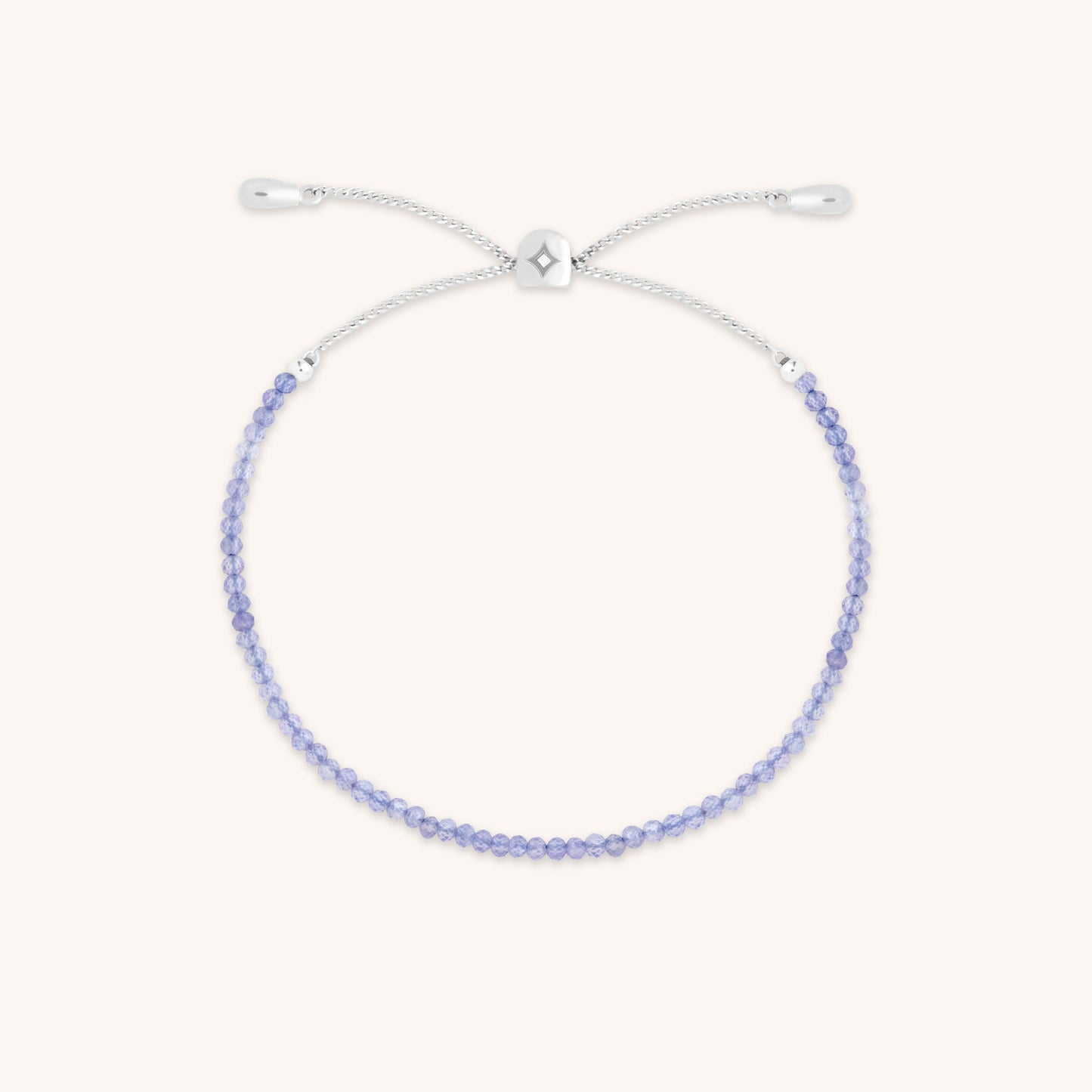 Bracelet with tanzanite beads for December in solid white gold