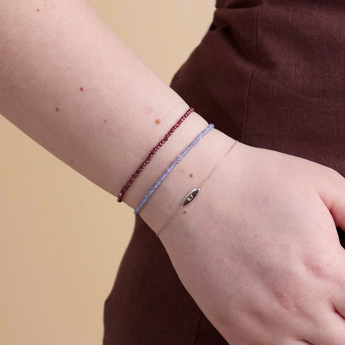 Bracelet with tanzanite beads for December in solid white gold