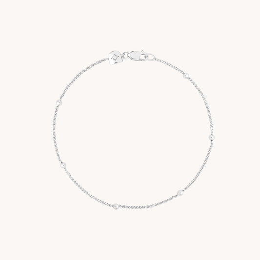 Essential bracelet with silver-colored beads